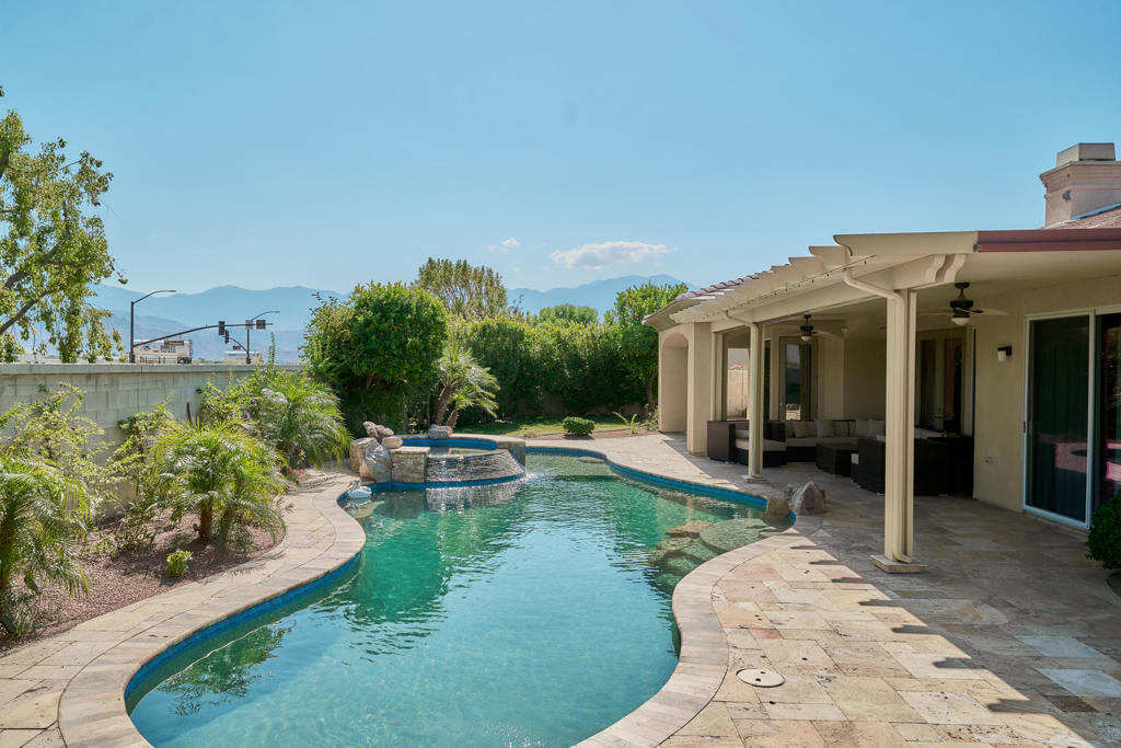 Welcome to this spacious and tastefully designed residence located in Versailles, a premier gated community in Rancho Mirage. Featuring 4 bedrooms and 3.5 bathrooms, this home provides generous space and privacy for families or visitors. 3,755 sq ft. Ideal for entertaining or everyday living. The main house includes 3 bedrooms plus an office/den. A detached oversized casita offers a sitting area and ensuite bath. The expansive lot offers a large outdoor area, perfect for relaxing, BBQs, or entertaining guests. Situated on a peaceful cul-de-sac, the property includes a 3-car garage. The home is partially furnished, with all personal belongings removed. Community amenities include tennis and basketball courts, wide streets, and walkable paths.