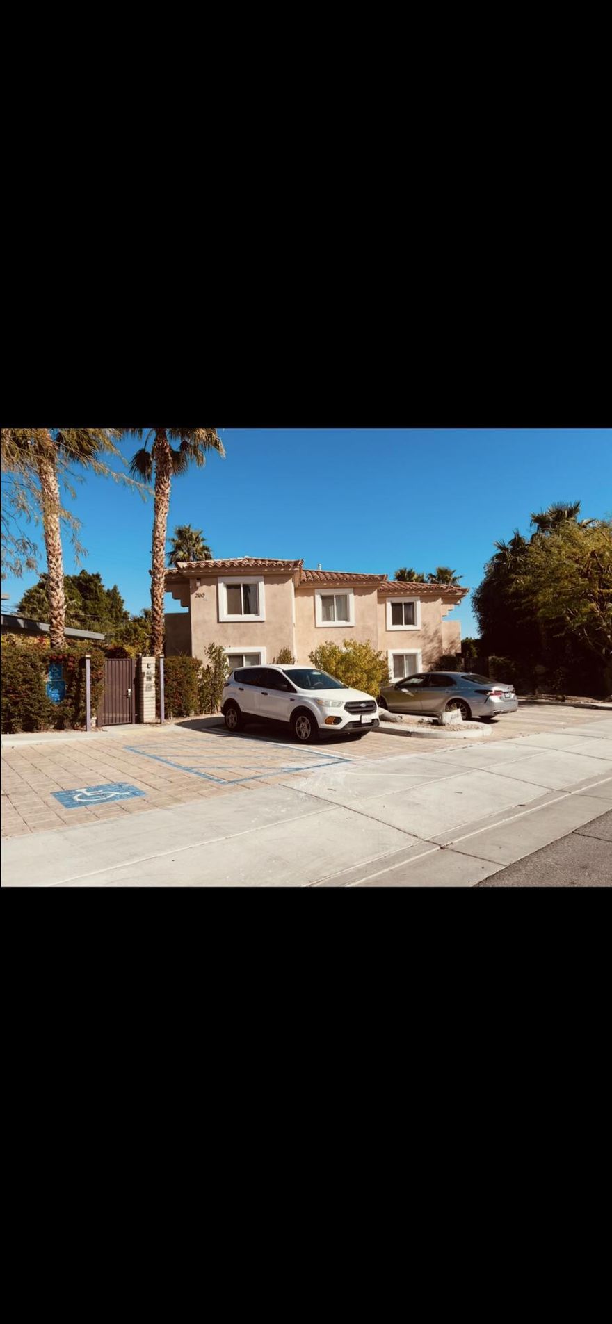 Two bedroom, two bath, with an additional flex space room, and three balconies. Views include mountain, pool and east city.Living room, dining room, and kitchen for an open living space, with the flex space for an office, studio or ?Pool and spa inside a gated community of just four units.