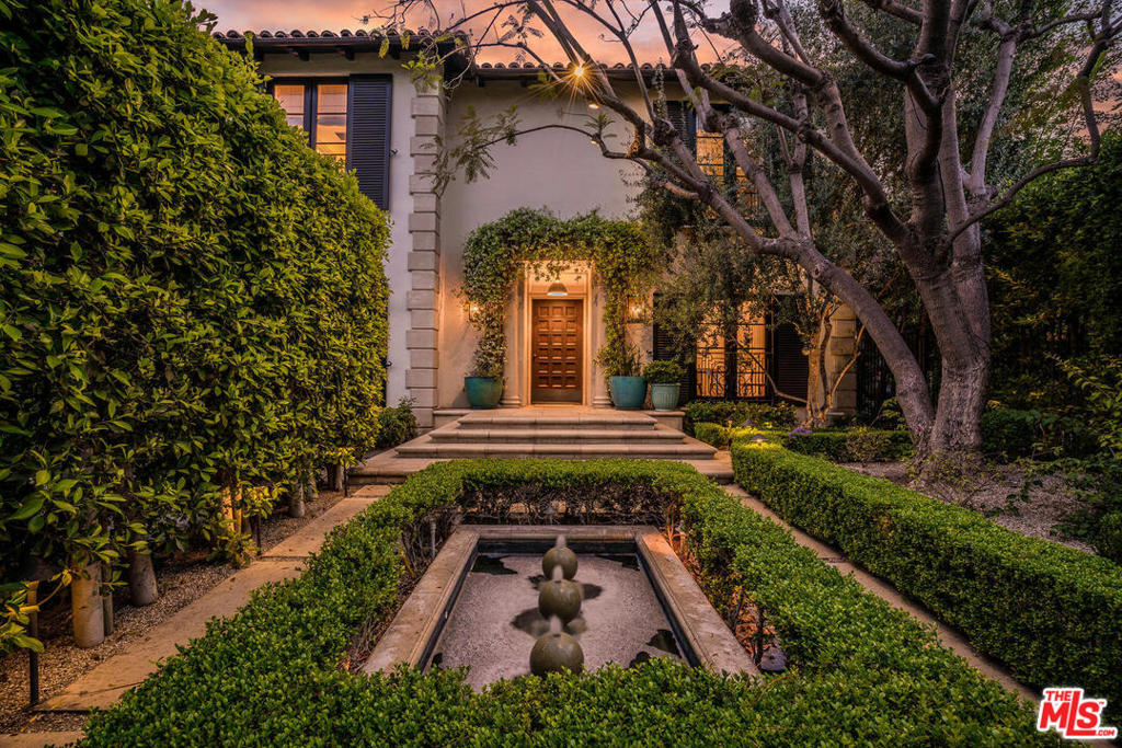 Incredible designer perfect jewel box. Completely hedged and private, this amazing retreat is beyond compare. Enchanting courtyard with beautiful fountains and mature trees create a magical entry. Living room is absolute perfection with high ceilings, stunning fireplace, and French doors leading out to charming yard. Dining room is perfect for large parties or more intimate gatherings. Family room off kitchen is drenched in sunlight. Kitchen is a designer showplace with oversized eat in island, French backsplash and original light fixtures from Grand Central Station. 4 huge bedrooms upstairs. Master bath and closet are incomparable, reminiscent of a Rodeo Drive boutique. Luxurious master is bathed in natural sunlight. All three additional bedrooms are en suite and offer incredible closet space. One additional bedroom adjacent to kitchen. Tall hedges create unrivaled privacy in the backyard. Pool. Grassy yard and outdoor kitchen. Abundance of parking, 4 in front,2 car garage. PERFECTION