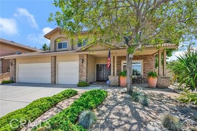 Welcome to your dream home across from the prestigious Rancho Vista Golf Course. This beautifully maintained 3,219 sq ft contemporary residence sits on a 6,176 sq ft lot and offers 6 generously sized bedrooms—including one conveniently located on the main level—and 3 full bathrooms. Inside, the open-concept layout creates a seamless flow between the living room, dining area, and spacious family room with a cozy fireplace, perfect for entertaining or everyday living. The chef’s kitchen is a standout, featuring granite countertops, a large center island, stainless steel appliances, and ample cabinetry. A well-equipped laundry room with washer/dryer, utility sink, and extra storage adds convenience. French doors open to a private backyard oasis with mature trees, drought-tolerant landscaping, and an above-ground spa—ideal for relaxing evenings under the stars. Additional highlights include central air conditioning, a three-car garage, and a large driveway. Built in 2004 and move-in ready, this home blends style, space, and comfort in one of Palmdale’s most sought-after neighborhoods—just over an hour from Los Angeles.
