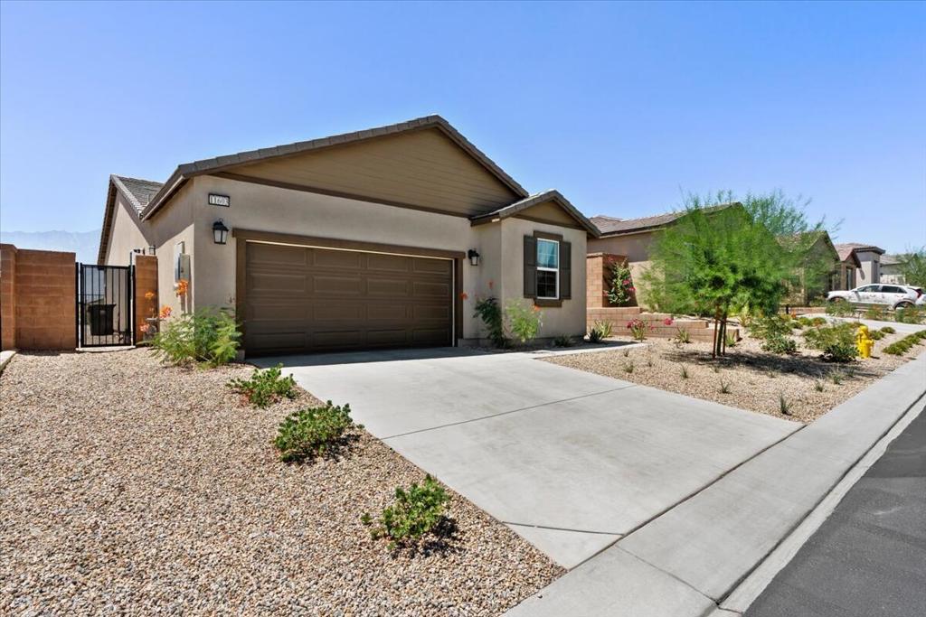 Enjoy breathtaking mountain views from this beautifully designed 3 bedroom, 2 bath home located in the gated community of Skyborne. The open floor plan is ideal for entertaining, featuring tile and carpet throughout, granite countertops, stainless steel appliances and a plethora of cabinetry for ample storage. The spacious kitchen flows effortlessly into the living and dining areas, creating a bright and airy atmosphere. With a low HOA and a backyard ready for your personal touch, this home offers both comfort and potential. Located just minutes away from vibrant downtown Palm Springs and just a short drive to Yucca Valley and Joshua Tree. Shopping, dining, entertainment, hiking and much more are right at your doorstep!
