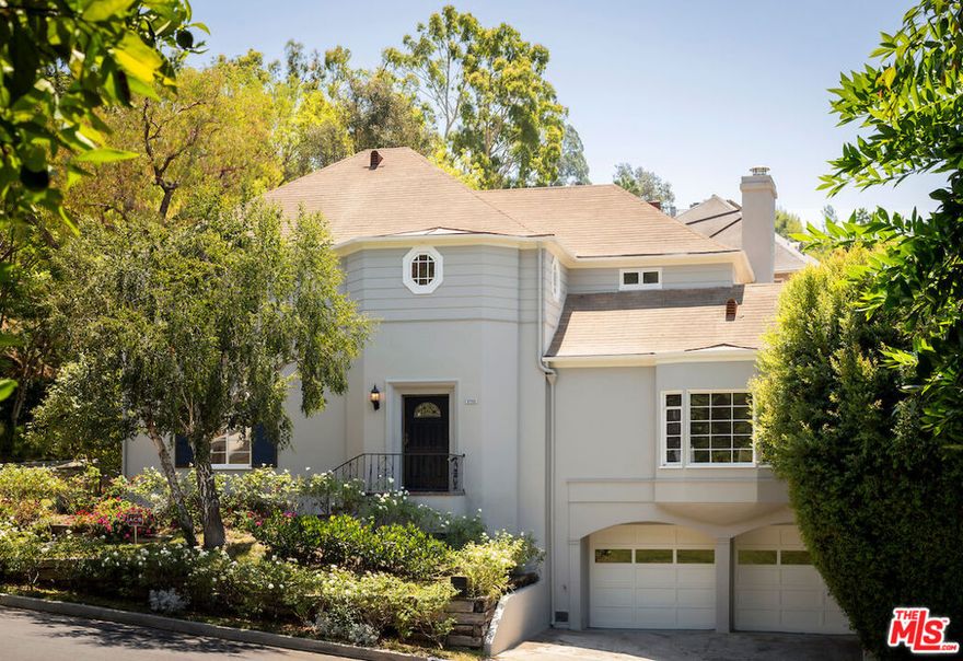 Welcome to this stunning 1939 Traditional home, perfectly nestled on a spacious corner lot in the prestigious Los Feliz Oaks neighborhood. Designed by acclaimed Los Angeles architect Benjamin L. Wiseman, this four-bedroom, four-bathroom residence blends classic charm with refined sophistication  a true gem in one of LA's most desirable enclaves. From the moment you enter, the home impresses with a dramatic foyer and sweeping staircase, setting the tone for its grand interiors. The richly paneled library, complete with a fireplace and a Dutch door leading out to the pool and spa, exudes warmth and character. Original details like gleaming hardwood floors, intricate moldings, and handcrafted finishes have been thoughtfully preserved, adding a layer of historic charm throughout. Perfect for both everyday living and elegant entertaining, the home features spacious, flowing rooms, a large bonus space, laundry room, and direct-access two-car garage. The backyard is a private oasis  ideal for relaxing or hosting under the California sun. With its architectural pedigree, graceful proportions, and timeless Old Hollywood glamour, this exceptional property offers a rare opportunity to own a piece of LA history  all while enjoying modern comfort and style.