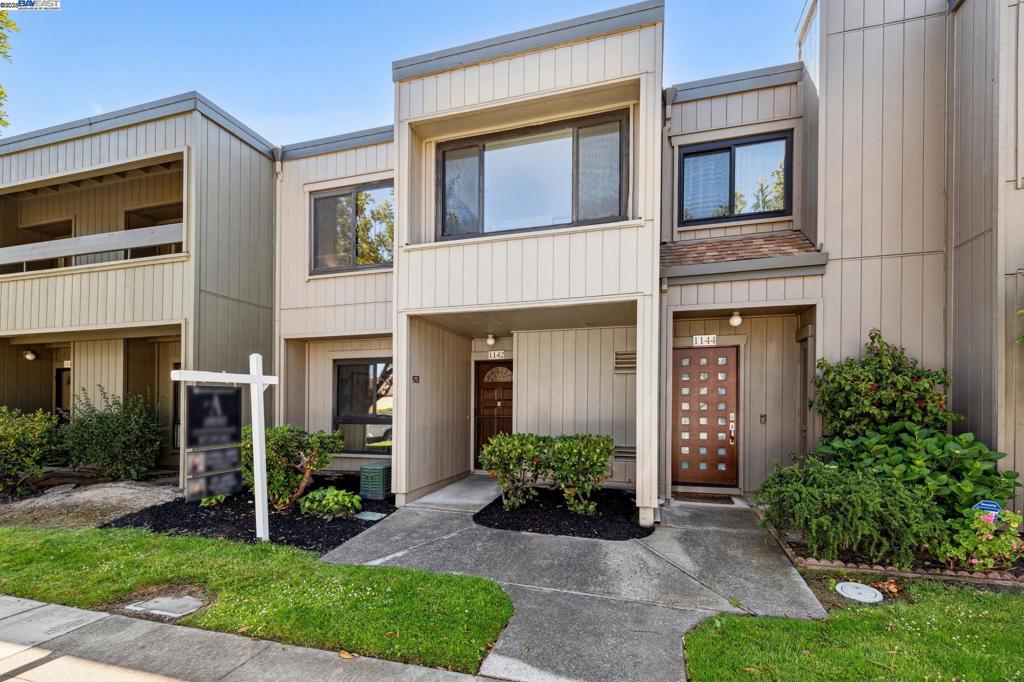 Welcome to Bay Farm Island living! This charming 2-story Garden Isle condo offers 3 bedrooms, 2.5 bathrooms, and a highly desired floorplan featuring a spacious living and dining area, wood-burning fireplace, and an eat-in kitchen. Enjoy the convenience of an in-unit laundry room, a main-level half bath, and a private outdoor patio perfect for relaxing or entertaining. The upstairs includes a primary suite with en-suite bathroom and walk-in closet, plus two additional well-sized bedrooms. Recent updates include fresh paint and new carpet throughout. A detached garage adds extra storage and parking. Community amenities include a sparkling pool and clubhouse. Just minutes from Corica Park Golf Course, Harbor Bay Landing shopping, parks, and top-rated Alameda schools. This is Bay Farm living at its best!