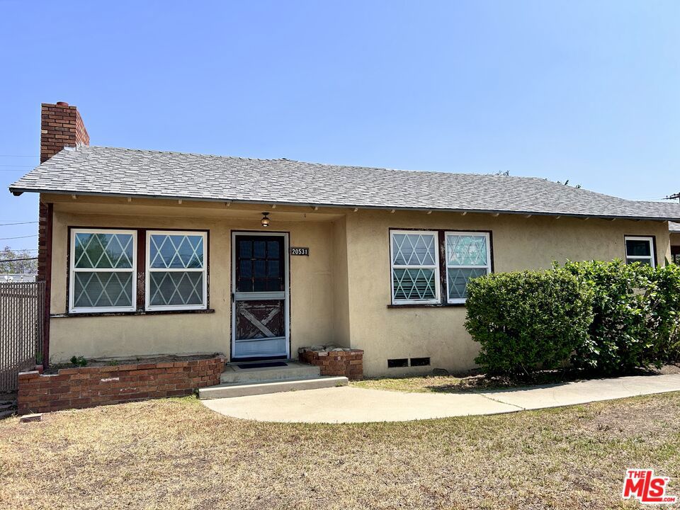 Bring your vision to life in this 1950's home full of charm and potential! Ideal for a purchase/rehab loan like the FHA 203(k), this property offers a spacious backyard and abundant parking including a front driveway, carport (currently a side patio), rear concrete pad, and garage with gated rear access via adjacent commercial property (not a public alley). Upgrades over the years include copper plumbing and dual-pane windows. The kitchen features solid wood cabinets worth preserving and reimagining, while the formal living and dining rooms offer a flexible layout for open-concept living or a blend of vintage and modern. Original in-floor heating, while an existing unused ceiling vent system offers a head start for possible central HVAC updates. A convenient half-bath near the side entrance serves outdoor gatherings, while the full bath showcases retro style, ready for a fresh take. First time on the market since 1971. Note: Home has a Covina address but is in a pocket of Unincorporated LA County known as "Charter Oak." Please reference PDF's attached to this listing and/or listing agents for more information.