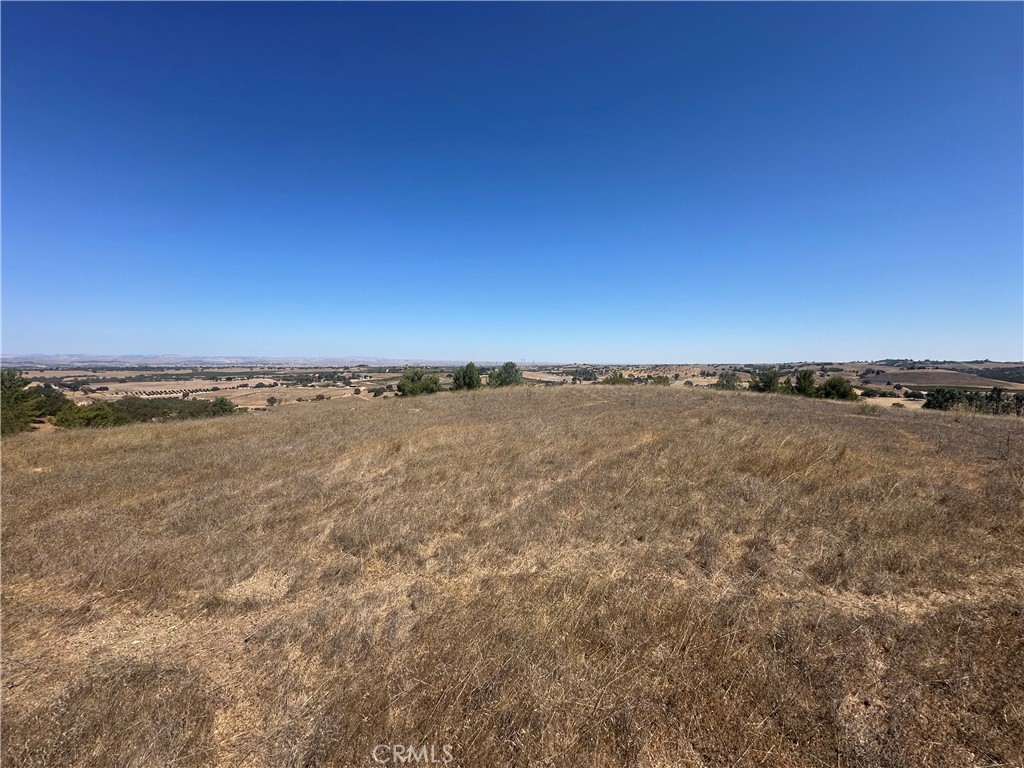 Stunning 360° Views in Gran Cielo.
Discover the perfect setting for your dream home within the exclusive gated community. Ideally located on a quiet cul-de-sac, this buildable lot offers both privacy and breathtaking panoramic views of the surrounding landscape.
Enjoy the peace and security of a premier enclave surrounded by the natural beauty of lush vineyards and gently rolling hills. With ample space and an unbeatable location, this parcel presents a rare opportunity to design and create a custom residence that embodies luxury living.
Gran Cielo is a limited community of just 42 custom home sites across 863 acres, including the renowned Huerhuero Vineyards of Vino Robles. Over 800 acres are permanently reserved as open space or agricultural land, ensuring enduring beauty and serenity. While there is no HOA, community standards are preserved through thoughtful CC&Rs and a design review committee, maintaining the consistency and prestige of this luxury neighborhood.
Infrastructure is already in place with underground utilities, including power, gas, cable/internet, and a community mutual water service.
Don’t miss your chance to own in one of California's fastest growing wine regions in a sought-after communities.