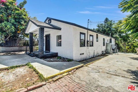 Photo of 425 N Eastern Avenue, Los Angeles, CA 90022 (MLS # 26841663)