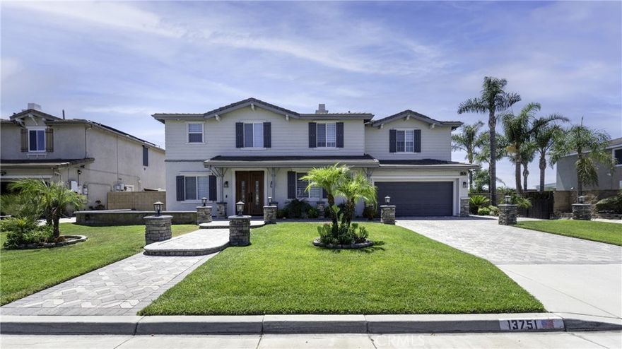 Located in the sought-after Etiwanda area, this turnkey two-story home offers six bedrooms, four and a half bathrooms, and 4,130 sq ft of living space on a 10,009 sq ft cul-de-sac lot. Interior highlights include high ceilings, crown molding, mixed flooring (carpet, laminate, tile, and wood), a laundry room with a wash basin, and a variety of room types such as a loft, Jack & Jill bedrooms, walk-in closets, and separate family spaces. The upstairs master suite boasts dual closets, a large retreat, and a spacious ensuite bath, while the downstairs bedroom/office includes a full bath. The gourmet kitchen features granite countertops, an island, double ovens, and an open layout that connects to the dining area. The expansive family room includes a fireplace and a built-in entertainment center, complemented by formal living and dining rooms. The home features a three-car tandem garage with direct access, driveway parking, public sewer and water, central air and heating (including forced air, a fireplace, and a solar-supported system), and a leased solar-powered system. The north-facing lot spans approximately 0.23 acres and includes a landscaped front yard, fenced backyard, RV and/or boat parking access, a covered patio with BBQ island and fire pit, and a private backyard with a heated in-ground pool and spa. This home is ideal for those seeking a blend of luxury, comfort, and convenience in a prime location. Enjoy mountain and neighborhood views, along with nearby amenities such as biking trails, foothills, sidewalks, and street lighting. The property is located within the Etiwanda School District and has no HOA fees.