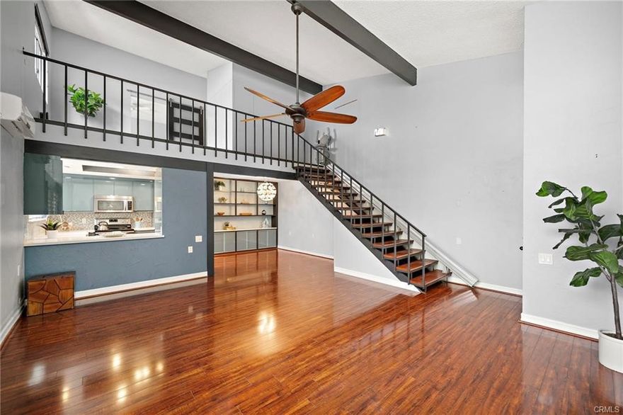 Stunning 2 story Seville floor plan wth 2 bedrooms, 2 bathrooms, loft and an enclosed patio that looks out a very private greenbelt park setting. Set on a bluff overlooking Via Estrada in a select enclave of similar scenic Seville models this home features a main floor bedroom and bathroom, a bedroom and bathroom upstairs plus a large loft. Some of the many features include: WOOD look flooring - MINI SPLIT A/C and HEAT - INSIDE LAUNDRY - SHUTTERS - REMODELED KITCHEN - REMODELED BATHROOMS - ENCLOSED PATIO - LOFT. This home has an open floor plan, offers large windows and a soaring vaulted ceiling. The living room has a sliding door to the enclosed patio. The beautifully remodeled kitchen has gorgeous cabinets, quartz countertops, custom backsplash, recessed lighting, stainless appliances and a farm style sink. The downstairs bedroom has a large window. The downstairs bathroom has been remodeled with a tile shower and modern vanity. The laundry is conveniently located downstairs as well. The spacious loft overlooks the dining and living rooms below. There is room in the loft for an office, seating area, hobby space or den. The upstairs bathroom has dual sinks, dressing table and a custom tile shower/tub. There is even a chair lift if you do not want to take the stairs. NO ONE ABOVE or BELOW. Laguna Woods is one of the most prestigious 55+ communities in Orange County. In Laguna Woods you have access to: bus system around the community & to area shopping, restaurants, medical facilities; 5 pools & 4 hot tubs; golf, tennis, library, 7 clubhouse, 200+ clubs, 3 fitness centers, theater, horse back riding/stables, garden centers, basketball, card rooms, billiards, bocce ball, Emeritus classes & more!