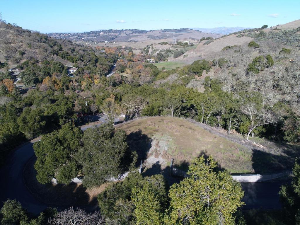 Beautiful and privacy of country living right above historic New Almaden on this spectacular 5.7 acre lot. The bldg site is graded and Cleared. Water, electricity & telephone are available nearby. Spectacular Panoramic Views of Almaden Valley, Quicksilver Park, and Adjoining Hills. Complete development plans was done in 2010. NOTE: Google map shows wrong location please use following direction: Take Almaden Rd. -- Left on Bertram Rd. -- About 1000 ft Turn Left on Cinnibar Hills Rd.