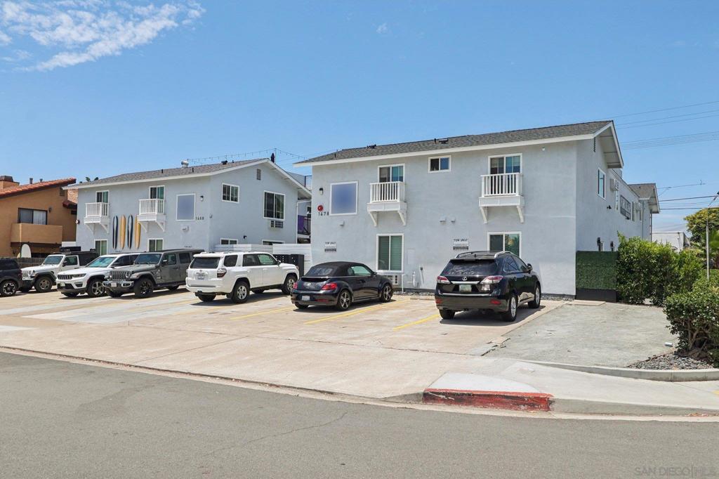 The Surf House at 1478 Hornblend Avenue, a fully rebuilt and modernized 10-unit apartment community in the heart of Pacific Beach, San Diego. Offered at $6,350,000, the property operates at a 4.73% cap rate and a 14.93 GRM—a rare combination of strong returns and turnkey quality in one of Southern California’s most supply-constrained coastal markets. Completed in June 2024, the building underwent a full down-to- the-studs renovation, including all-new systems: 600-amp elec- trical (100-amp per unit), new plumbing, central water heater, and a 2024 fire sprinkler system. Structural upgrades include a new foundation, roofing, stucco, windows, gutters, and steel staircases. Interiors were finished with quartz countertops, custom cabinetry, stainless steel appliances, designer tile, luxury vinyl plank flooring, in-unit laundry, and split HVAC systems. Each unit also features pri- vate outdoor space—exclusive yards or roof decks with panoramic ocean and bay views. All construction was completed with 100% City of San Diego per- mits and built to current code—a major differentiator in the coast- al market. Located just six blocks from the beach and steps from Garnet Avenue, The Surf House offers a 96 Walk Score and long- term rent growth potential, supported by strict coastal zoning and limited new apartment development in Pacific Beach.