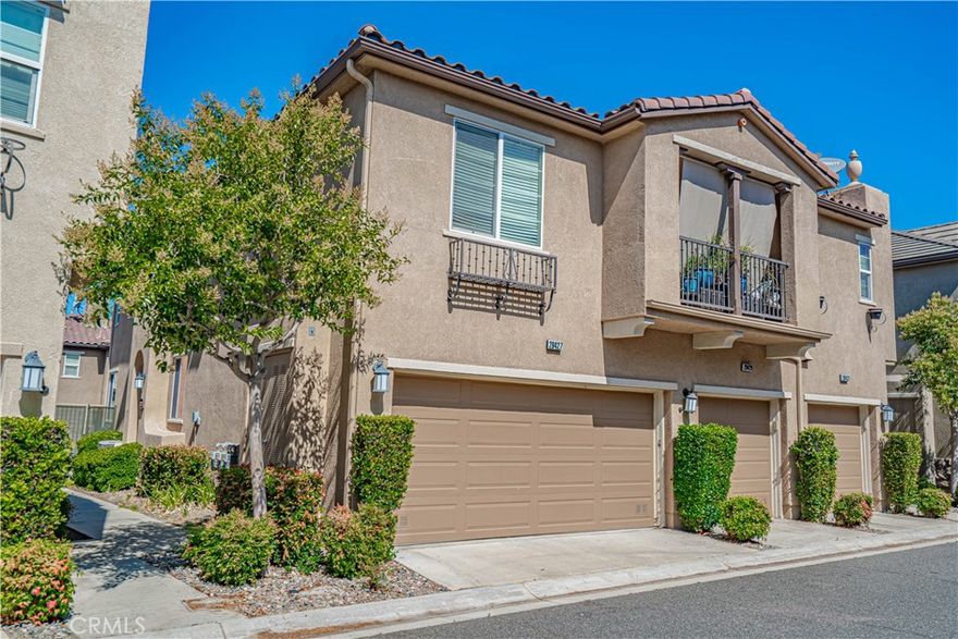 Welcome to this stunning 3-bedroom, 2.5-bath townhouse offering 1,520 square feet of stylish and comfortable living space. Inside, you'll find updated flooring throughout the entire downstairs and fresh neutral paint that creates a bright, inviting atmosphere. The spacious dining area and living room are perfect for entertaining guests or relaxing with family. The inside laundry room adds convenience, while the master bathroom features dual sinks for ease and comfort. The home also includes a two-car garage for ample parking and storage needs. Step outside to enjoy a private backyard, ideal for outdoor gatherings or quiet evenings.

Residents have access to fantastic community amenities, including a pool and spa, perfect for unwinding during warm days. This lovely townhouse combines modern updates with practical features in a desirable neighborhood—your ideal home awaits!
