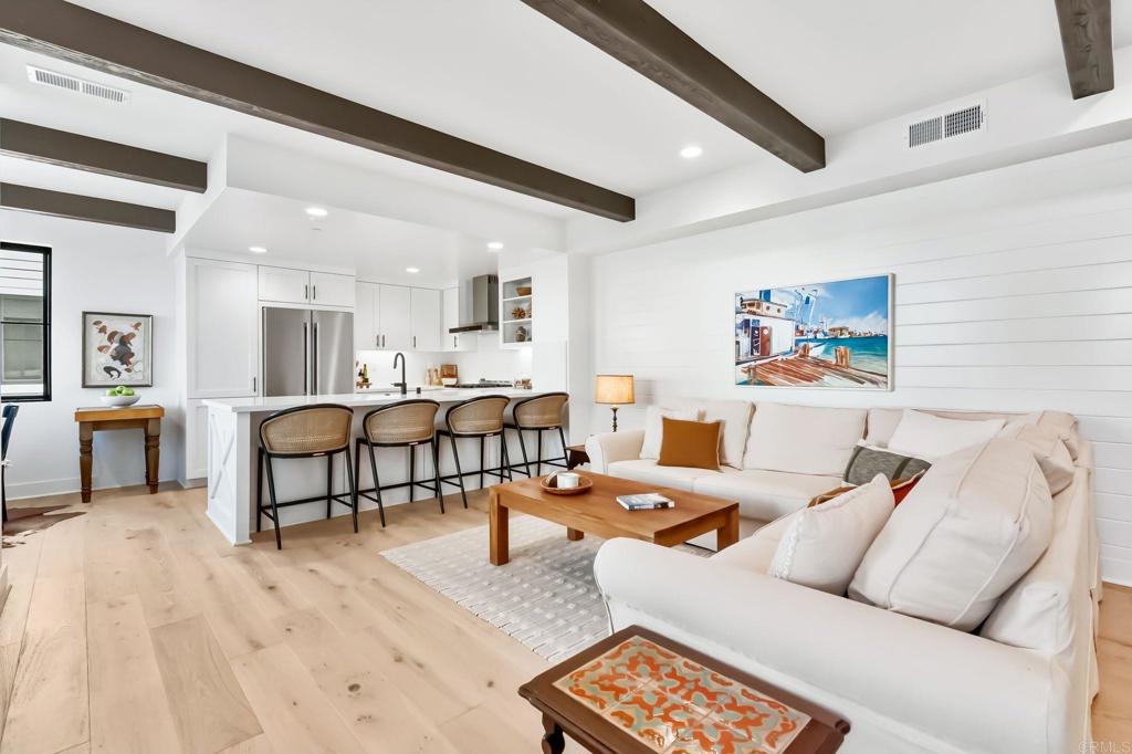 Welcome to Fox Point Farms, Encinitas’ new agrihood community blending modern homes with farm-to-table living. This 1 bed, 1.5 bath residence offers $62,500 in upgrades, including a premium $40,000 corner lot. The interior features white oak hardwood floors, JennAir appliances, and a dining nook that opens to the living area and private patio. Upstairs, the primary suite showcases a beautifully finished bath with black hexagon tile flooring and designer shower tile. Added benefits include owned solar, extra wall insulation, and a direct-access single-car garage. Fox Point Farms delivers more than a home—it’s a lifestyle. Enjoy onsite dining at Haven Farm + Table, fresh produce at Harvest Market, tacos from Huerta, artisan breads from the Bakehouse, coffee at Fox Point Roasters, craft beer at Fox Point Brewing Co., and live music on weekends—all right outside your door.