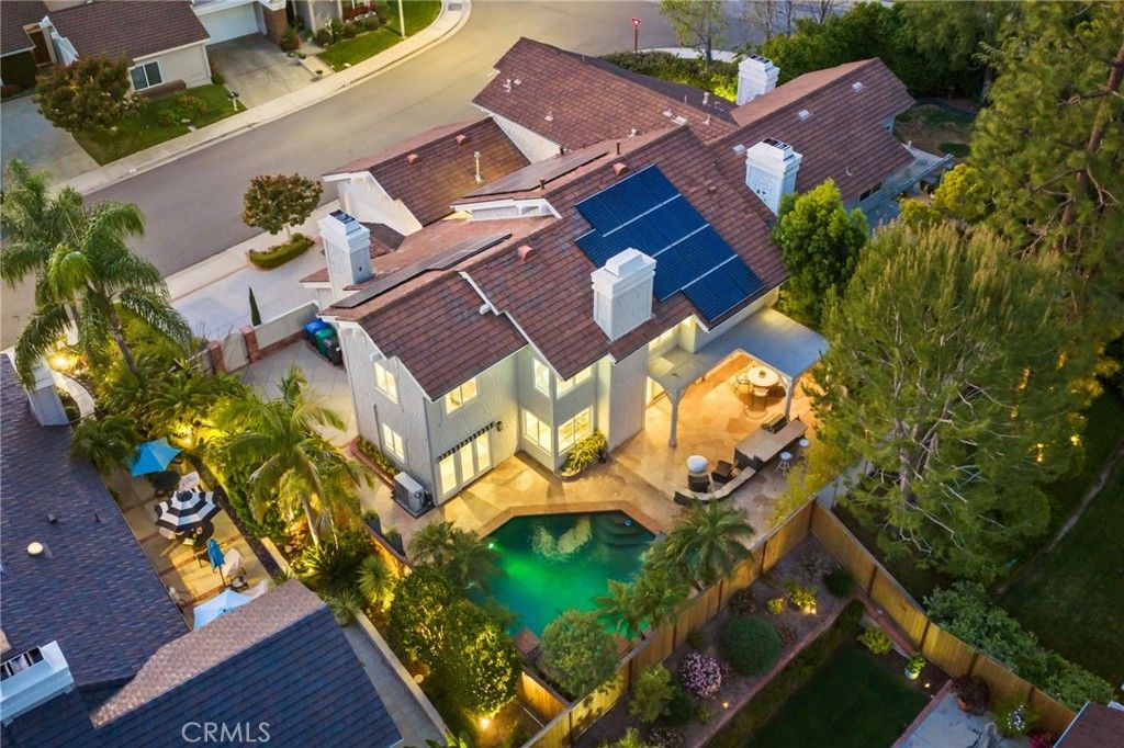 Photo of 3 Candlebush, Irvine, CA 92603 (MLS # OC26038610)