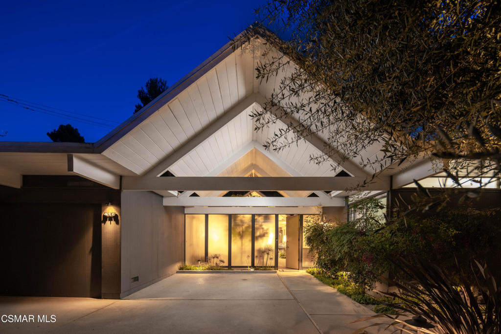 The ''Double Gable'' Eichler - designed by A. Quincy Jones and Frederick E. Emmons - is one of the most coveted and uncommon floorplans ever built. Known as the OJ-1605 ''U-shaped'' model, it was reserved for extra-wide lots and offered only in a handful of Eichler communities. With its expansive footprint, 416 Camino Manzanas is not only one of the largest Eichlers ever constructed - it was also among the most expensive at the time, requiring a uniquely suited homesite to accommodate it. Tucked away and shielded by the Conejo Open Space Conservancy on two sides, with just one neighboring property, this home offers an extraordinary sense of quiet and privacy than most - more reminiscent of a weekend retreat than an in-town residence. A one-car garage and adjacent carport enhance the feeling of seclusion, while the iconic atrium design anchors the indoor-outdoor lifestyle Eichler is known for. This particular layout includes the exceptionally rare 5-bedroom configuration. Thoughtfully reimagined with reverence for the original, every detail has been meticulously preserved or artfully elevated. From walls of glass and new mahogany paneling to modern enhancements that quietly improve comfort without compromising character, the balance is impeccable. 7 individual mini-split AC units provide tailored climate control, while the original radiant heat system and boiler continue to perform just as Eichler intended.The kitchen is a modern showpiece - sleek in white and gray, with quartz countertops that echo the spirit of the original Formica but offer a more refined, contemporary finish. Smart updates - like converting the fifth-bedroom ''retreat'' into an office, and discreetly relocating the laundry from the hallway into a dedicated room - add thoughtful functionality to the home's timeless flow. Even the atrium has a retractable awning! Outside, the home fully embraces its connection to nature. An expansive elevated deck, canvas-covered patio, sculptural fountains, firepits, lush yard, and luxurious swim spa create a private sanctuary equally suited for quiet reflection or vibrant entertaining. As the sun sets, landscape lighting casts a warm glow across the property, transforming the space into something magical.Words can only go so far. This is more than a house - it's a design-forward experience, lovingly crafted and ready to be lived in. Whether you just bring your toothbrush or your peg-leg pants, your smoking jacket or your favorite Sinatra LP, one thing's certain: once you arrive, you'll never want to leave.Close to top-rated schools, Los Robles Regional Medical Center, great shopping, and the 101 freeway, 416 Camino Manzanas isn't just a rare Eichler - it may be one of the finest.