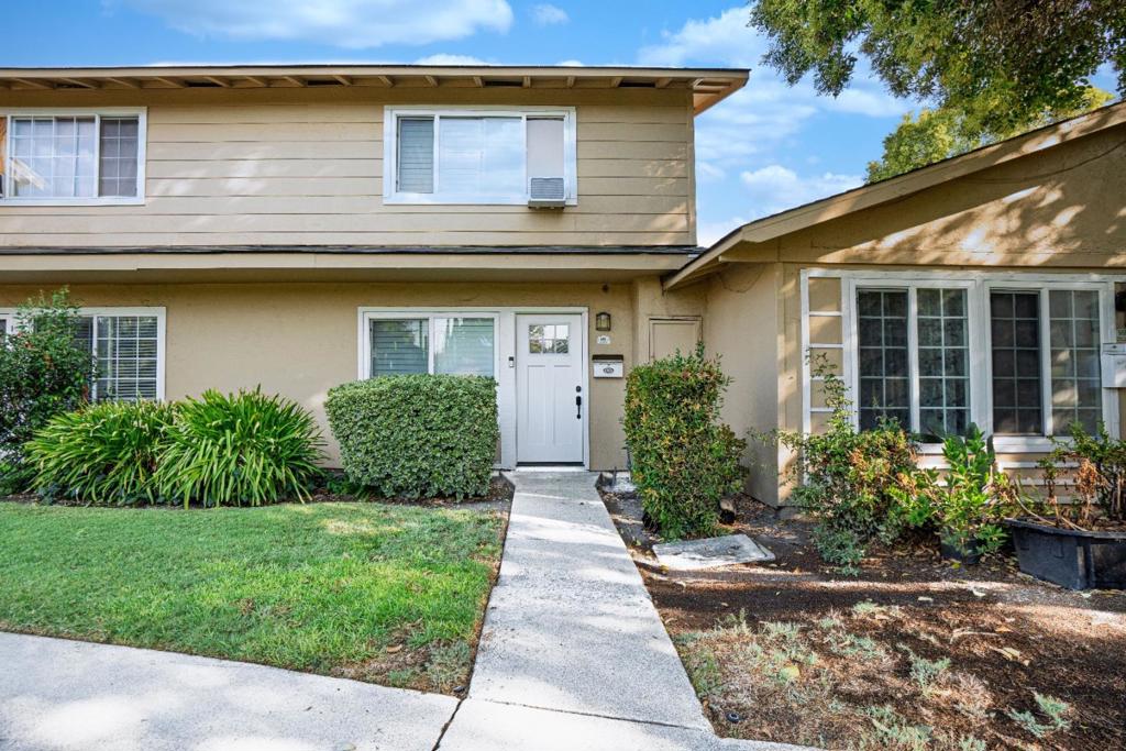 Welcome to this beautifully updated 2 bedroom, 1.5 bath townhome in the heart of San Jose. The thoughtfully designed kitchen offers plenty of counter space, perfect for meal prep and family gatherings, while the separate family room provides a cozy retreat for relaxing or entertaining. Enjoy elegant luxury vinyl plank flooring that flows seamlessly throughout, complemented by recent fresh paint, recessed lighting, and stylish fixtures that give the home a modern touch. Convenience is built in with a dedicated laundry area and a 2-car carport located just steps from the kitchen for easy access. Outside, you'll find nearby green space and a playground ideal for families to enjoy. Whether you're a first-time buyer or looking to downsize, this move-in-ready home offers comfort, charm, and an excellent location in vibrant San Jose. Some photos has been virtual stage.