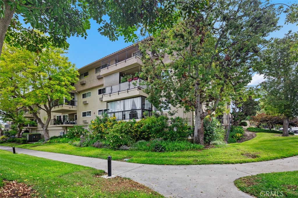 Discover comfort and style in this lovely upgraded "GARDEN VILLA" model, located in the serene Laguna Woods retirement community. This spacious 3-bedroom, 2-bath unit features Travertine wood flooring, a brand-new oven, microwave, and dishwasher, along with a new faucet. In addition, features include crown molding, smooth ceilings, ceiling fans, lots of storage, and more. The bathrooms and kitchen feature upgraded flooring, and the home is equipped with central heat and air for year-round comfort, along with an eat-in kitchen. Enjoy the balcony off the living room. GREAT home for entertaining! Enjoy the convenience of vertical blinds and the peaceful ambiance of this incredible 55-plus community. One of the standout features of this home is the highly sought-after subterranean parking, which provides convenient access to the building elevator and ensures you stay dry on rainy days, PLUS storage cabinets. Additionally, residents can enjoy a spacious recreation room, perfect for gatherings and socializing. Living here means more than just a beautiful home. Enjoy an unbeatable lifestyle with the amenities offered by Laguna Woods Village, including A 27-hole championship golf course or 9-hole executive par three courses, Tennis, paddle tennis, pickleball, and lawn bowling facilities, Two fitness centers, and seven clubhouses, Five swimming pools, An equestrian center and extensive gardening opportunities, An art studio and a world-class woodshop, Over 200 clubs and organizations to suit every interest. With free bus transportation around the community and to nearby shopping, as well as economical RV storage, Country Club Living is at its finest, just approximately 6 miles from the stunning Laguna Beach. It is genuinely the BEST HIDDEN SECRET in Orange County, ensuring you will never run out of things to do. Enjoy the winning combination of a beautiful condo with exceptional community amenities. Your ideal "LEASE" and lifestyle await! *SEE VIDEO*