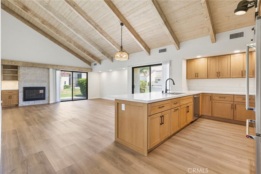 Welcome to this beautifully updated and charming 1-bedroom, 1.5-bath Tennis Villa in the heart of Mission Hills Country Club. This spacious corner unit has been tastefully upgraded throughout, featuring modern flooring, refreshed cabinetry, updated lighting, and stylish fixtures. The inviting floor plan offers a seamless flow from the upgraded kitchen into the dining area and Great Room, where you’ll enjoy serene backyard views and a cozy fireplace that adds warmth and character. The primary suite includes a private patio door that opens to lush greenery, along with a well-maintained ensuite bath. The home also features an in-unit washer/dryer, three patios surrounded by mature trees and grassy areas, and a detached two-car garage. Tucked behind a gated courtyard and just steps from the pool and lake, this home offers a perfect blend of privacy and resort-style living. Located near the Mission Hills Sports Clubhouse, you'll enjoy spectacular mountain views, convenience to restaurants, grocery stores, Starbucks, and freeway access. Mission Hills Country Club Amenities Include: 24-hour security, 3 championship golf courses & full practice facility, USTA’s #1 tennis facility with 34 courts (grass, clay & hard), Award-winning croquet courts 17,000 sq. ft. spa & sports center with fitness classes, water aerobics & personal training. 2 championship bocce courts, Clubhouse dining and social events, Whether you're looking for a full-time residence or a weekend retreat, this updated Tennis Villa offers the perfect balance of comfort, style, and access to world-class amenities.