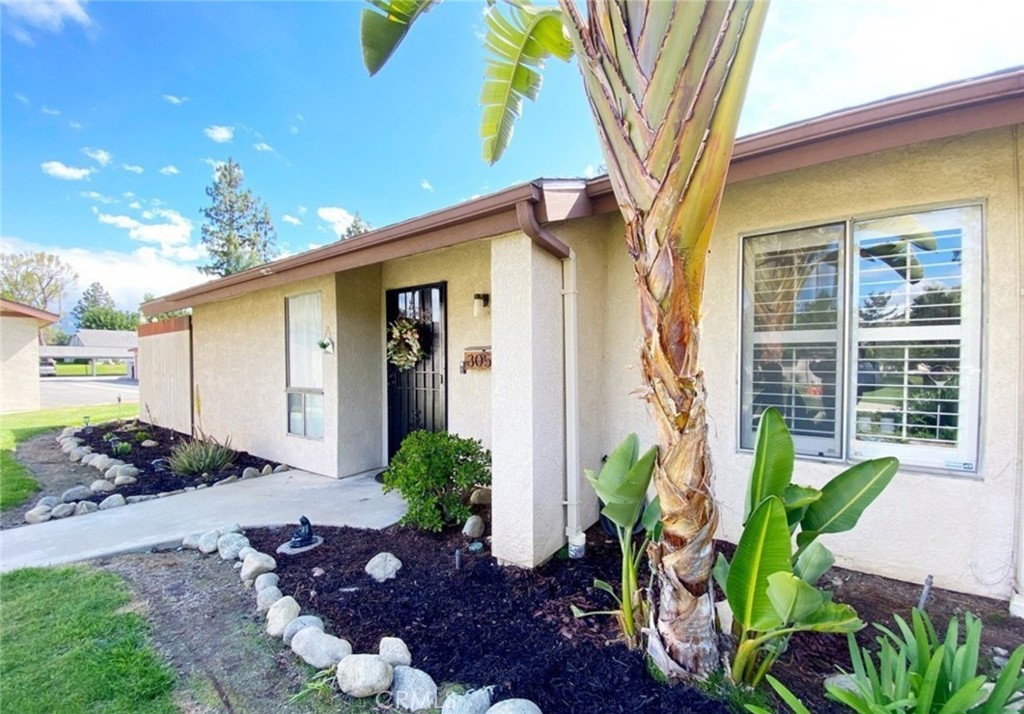 FHA-approved and stylishly updated, this modern industrial condo offers comfort, character, and thoughtful upgrades throughout. Featuring an open floor plan with vaulted ceilings and oversized windows, the space is flooded with natural light. This 2-bedroom, 1.5-bath home offers nearly 1,000 square feet of inviting living space with waterproof luxury vinyl plank flooring and plantation shutters in both bedrooms. The kitchen shines with modern cabinetry, a newly added backsplash, sealed concrete countertops, stainless steel appliances (including a gas range/oven, microwave, and sink), and an island with bar-top seating, ideal for entertaining. Recent upgrades include an energy-efficient tankless water heater, new front window and patio door replacements, and smart home features like a Ring doorbell and Nest thermostat. Through oversized sliding doors, step onto your private 300 SF covered patio with brick flooring and planters, perfect for indoor-outdoor living year-round. A detached garage is located just steps away for added convenience. Centrally located about 35 minutes from Mount Baldy and within walking distance to shopping centers and the mall, the home also offers easy access to the 10, 60, and 210 freeways. It’s just a 10-minute drive east or west to nearby Metrolink stations. Outdoor enthusiasts will love the nearby dog park off 11th Street and the scenic Pacific Trail. And for college students, Claremont McKenna College is only 6 minutes away. Move-in ready and priced to sell, don’t miss your chance to own this stylishly updated gem!