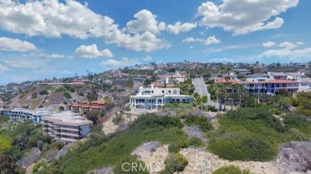 Perched above the coastline, this stunning single-family residence offers sweeping ocean views and an expansive layout spanning approximately 5,000 square feet. With 4 bedrooms and 5 bathrooms, this home combines luxury and comfort in one serene setting.
Enjoy natural light flooding through large glass windows, showcasing spectacular views and creating a warm, inviting atmosphere. The entertainer’s kitchen features a spacious island, walk-in pantry, and stainless steel appliances—perfect for hosting or everyday living. The expansive great room includes a dedicated dining space and family room with a built-in bar area for seamless entertaining.
A grand staircase leads to the elegant primary suite, complete with a marble fireplace and tranquil ambiance. A private guest bedroom offers comfort and seclusion. Additional highlights include a spacious brick atrium that blends indoor and outdoor living, an indoor laundry room, and a 2-car attached garage.
Gardener services are included. This home is truly a coastal dream!