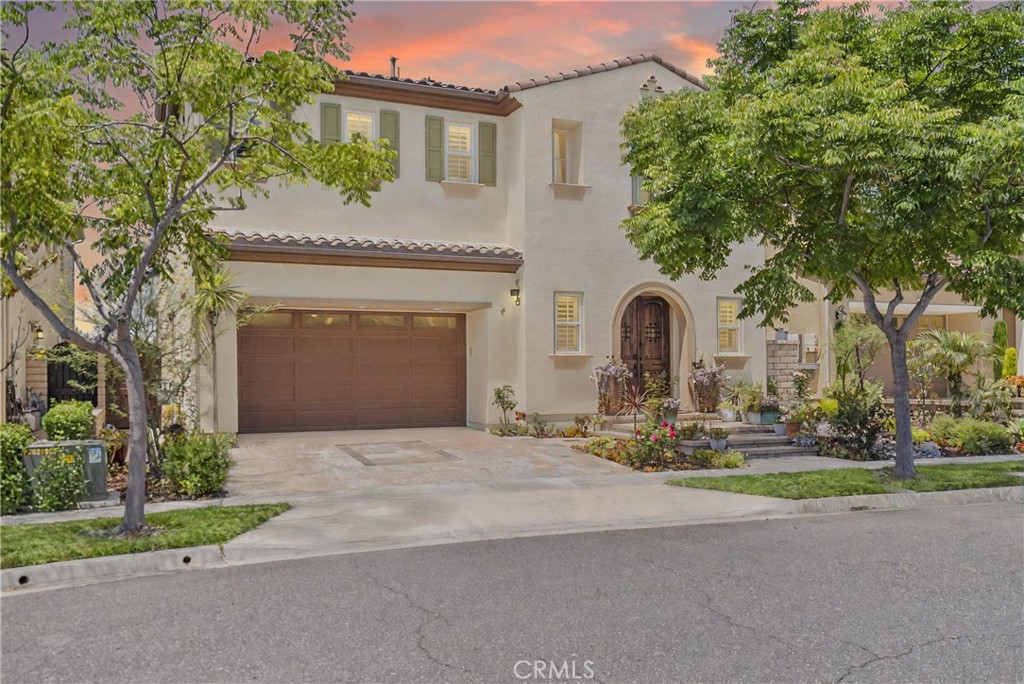 Welcome to 46 Dogwood, a beautifully upgraded 5-bedroom, 5.5-bathroom Toll Brothers home offering 3,273 square feet of luxury living in the prestigious Highlands neighborhood of Baker Ranch. This exceptional property includes a ground level casita with its own private entrance, living room, kitchenette, bedroom, and full bath—perfect for guests, multi-generational living, or a private office.
With over $300,000 in designer upgrades, this home offers a blend of refined elegance and modern comfort. From the grand double-door entry, you’re welcomed into a dramatic two-story foyer with a sweeping curved staircase and thoughtfully designed built-ins that set the stage for the rest of the home.
The open floor plan is flooded with natural light and features a cozy fireplace, generous living areas, and a chef-inspired kitchen with an oversized quartz island, wraparound breakfast bar, full-height soft-close cabinetry, built-in refrigerator, high-end stainless steel appliances, farmhouse sink, walk-in pantry, reverse osmosis system, built-in desk, drop zone, and designer lighting. Expansive pocketing glass doors open to a stunning California Room, outfitted with custom cabinetry, a wine and beverage refrigerator, and motorized screens and drapes for ideal indoor-outdoor entertaining.
Each bedroom includes its own ensuite bathroom, and the luxurious primary suite offers tray ceilings, dual walk-in closets with custom organizers, a spa-like bath with an oversized shower and soaking tub, and pocket glass doors that open to a private deck with scenic hillside views.
Additional features include smart home technology such as video doorbell, smart locks, thermostats, and a smart garage opener. The garage is finished with epoxy floors, built-in cabinets, overhead storage, a workbench, EV charger, and a whole-home water softener and filtration system. The home is also equipped with a 5.2 kW Tesla solar system for added energy efficiency.
Located in the resort-style community of Baker Ranch, residents enjoy access to multiple parks, six heated pools and spas, scenic trails, fitness areas, clubhouses, BBQ stations, fire pits, sport courts, and a dog park—all with no Mello-Roos and low HOA dues. This is an incredible opportunity to own a turnkey luxury home in one of Lake Forest’s most desirable neighborhoods.