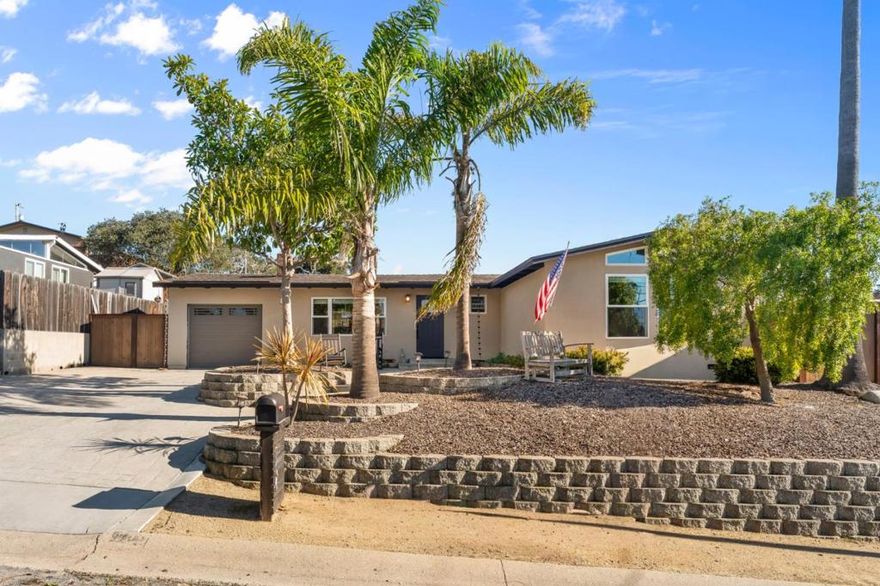 This beautifully updated four-bedroom, two-bath home blends quality craftsmanship with modern comfort. The vaulted ceilings with exposed beams create an open, airy atmosphere, while extensive recent upgrades provide peace of mind. Highlights include a brand-new 50-year roof, stucco exterior, and dual paned windows throughout. The kitchen is thoughtfully designed with new appliances, granite countertops, and custom Jarra and tiger maple cabinetry, offering both style and functionality. The home has been meticulously maintained, with substantial improvements that enhance both aesthetics and long-term value. Step outside to a spacious, low-maintenance backyard featuring elegant hardscaping, a gazebo with a hot tub and sauna, and a built-in fire pitperfect for relaxing or entertaining year-round. Ideally located just a five-minute drive to the beach, with easy access to local restaurants, shops, and the highway, this home offers the perfect balance of comfort, convenience, and coastal living. This listing wont last long, dont miss your chance to make it your own!