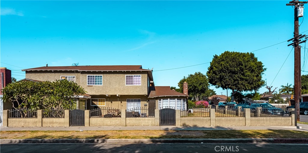 **CALLING ALL INVESTORS**Welcome to 296 E Marker St! A spacious duplex with tons of potential. Sitting on an expansive corner lot, this well-laid-out property features two attached units—perfect for investors or owner-occupants looking to offset their mortgage with rental income. The larger unit includes 4 spacious bedrooms and 2 full bathrooms, while the second unit offers 2 bedrooms and 2 bathrooms, giving you flexibility for multi-generational living or dual rental streams.
Inside, both units are thoughtfully designed with sunken living rooms, separate dining areas, and generous storage space throughout. The bedrooms are large, the layouts functional, and there's indoor laundry for added convenience in each unit. While the property is fully livable as-is, it’s ready for a light cosmetic refresh to significantly increase value and rental appeal—ideal for investors looking for a property with upside.
Outside, the property continues to impress. A private in-ground pool creates a central outdoor feature perfect for entertaining or relaxing. The 3-car garage adds major value in this area, and there’s plenty of off-street parking as well.
Location-wise, you're just minutes from the 710 and 91 freeways for easy commuting - an added perk for tenants or future buyers. Whether you're looking to live in one unit and lease the other, or rent both for passive income, this duplex offers a strong return profile in an up-and-coming neighborhood. Don’t miss out, schedule your showing today!
