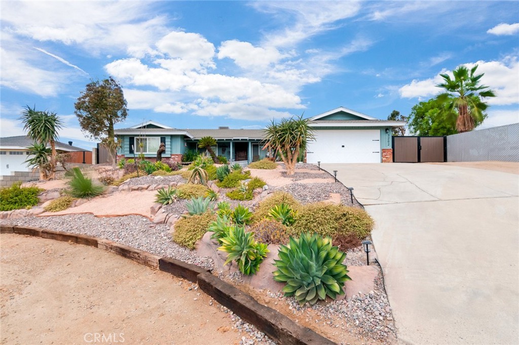 **CHARMING NORCO RANCH-STYLE HOME!**
Welcome to this beautifully upgraded single-story, 4-bedroom home nestled on a cul-de-sac in Norco. Set on over half an acre, this property blends modern comfort with country living. Step inside to an open floor plan featuring recessed lighting, striking beamed ceilings, and custom flooring throughout. The home boasts newer windows with plantation shutters, creating light and inviting atmosphere. The upgraded kitchen is a chef's delight, complete with granite countertops, stainless steel appliances, and a newer Café stovetop with double oven. Both bathrooms have dual sinks and custom granite counters, while the master bathroom has an upgraded walk-in shower. The exterior is equally impressive with new paint, newer gates, and fencing surrounding the property. The front yard is beautifully landscaped, while the backyard is a private oasis with a brand-new pool and spa, and covered patio. For those who love the equestrian and ranch lifestyle, the property is equipped with two box horse stalls with pipe turnout, a large chicken coop, barn for storage, and rolling fence access to the back of the property- perfect for trailers, toys, or RVs. Water runs conveniently to the coop and stalls, while solar motion lights add extra functionality. Additional features include a newer AC, heater, alarm system with cameras, genie pad, and a new filtration system in the garage. This exceptional property truly offers the best of both worlds - modern upgrades and ranch-style living in the heart of Norco!