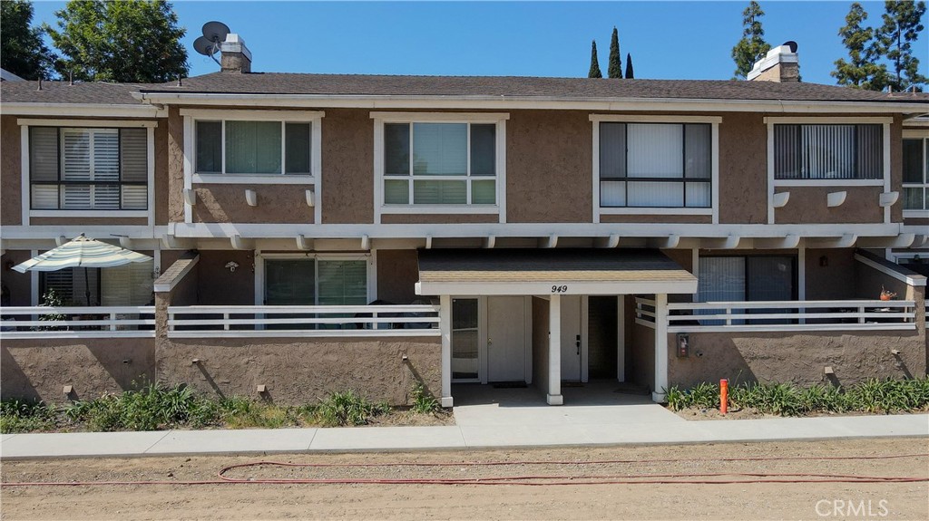 Welcome to Your New Home in the Heart of La Habra! What a rare find! This light, bright, and beautifully designed **tri-level townhome** offers the perfect blend of comfort, style, and functionality — all tucked away in a highly desirable location just steps from Trader Joe’s, Regal Cinemas, and La Habra Marketplace. Step right off Imperial Highway into your private 2-car attached garage, where direct access into your home makes life extra convenient. The garage even includes laundry hookups and a handy workbench – ideal for weekend projects and easy at-home washing. On the main level, you’ll be greeted by a warm and cozy living room with soft carpeting underfoot, a charming fireplace, and a built-in bar — perfect for relaxing evenings or entertaining friends. Sliding glass doors open to your own private balcony, where you can enjoy a quiet morning coffee or unwind after a long day. The kitchen is fresh and functional, featuring updated tile floors, a gas stove, a dishwasher, and an open layout that flows seamlessly into the dining area. The kitchen and dining windows look out onto a peaceful greenbelt and open park space — a refreshing and calming view compared to facing another building. This level also includes a convenient half bath, a storage closet, and plenty of linen cabinets to keep everything organized. Double-pane windows with shutters bring in lovely natural light while keeping the space private and energy-efficient. Upstairs, you’ll find your private retreat. The vaulted ceilings and skylight create a light and airy atmosphere throughout the upper level. The spacious primary bedroom is a true sanctuary, complete with a massive wall-to-wall closet and a sun-filled window. The second bedroom is perfect for guests, a home office, or anything else you need. The full bathroom feels like your own little spa, featuring a tub and shower, a long vanity, and plenty of storage. Additional built-in hallway cabinets make keeping things tidy a breeze. From the moment you walk in, this home flows beautifully across all levels — offering comfort, character, and space in all the right places. Whether you're hosting friends, working from home, or just enjoying a peaceful evening in, this townhome fits every part of your lifestyle.
Come see it for yourself — your new beginning starts here!