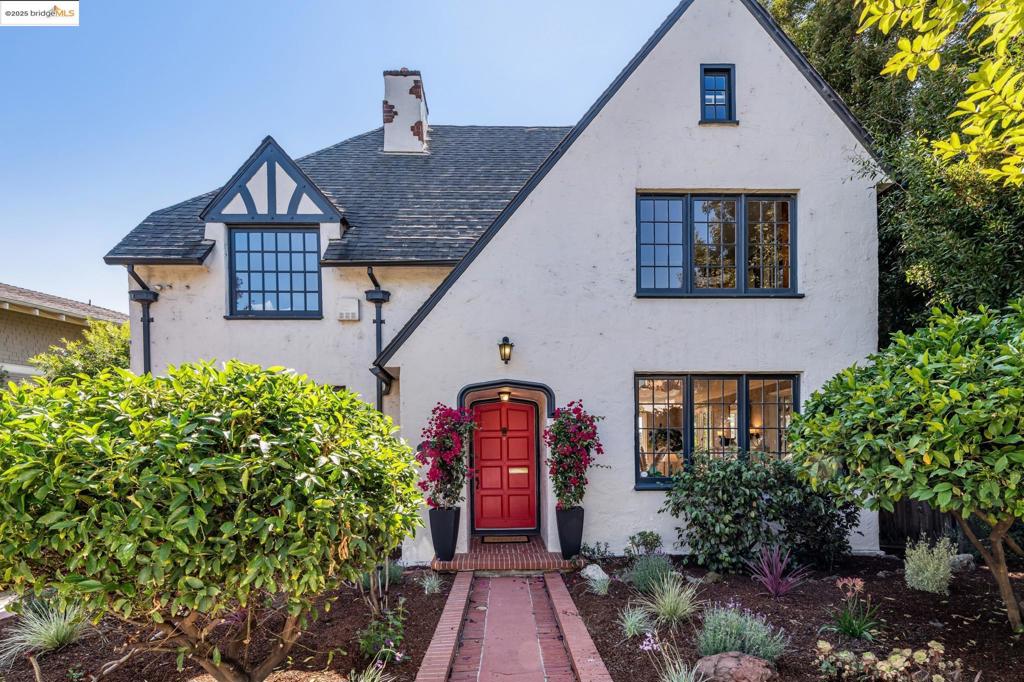 Location perfection near Arlington Circle! Luminous 4 bedroom, 2.5-bath home full of character in an ideal North Berkeley location near Solano Ave. The main level features hardwood floors, a dining room that glows with afternoon light, a front office with built-ins, and a kitchen with access to the back yard and half bath. Upstairs offers three ample bedrooms and an updated full bath, while the attic has Bay views and great versatility. The lower level functions as a separate space with its own entrance and a bedroom, full bath, storage, and garden access. Detached garage for even more storage or potential ADU.