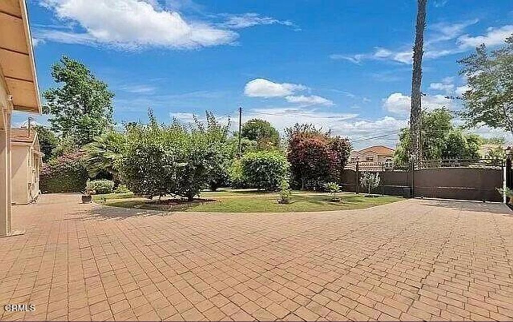 Photo of 5701 Corbin Avenue, Tarzana, CA 91356 (MLS # P1-25076)