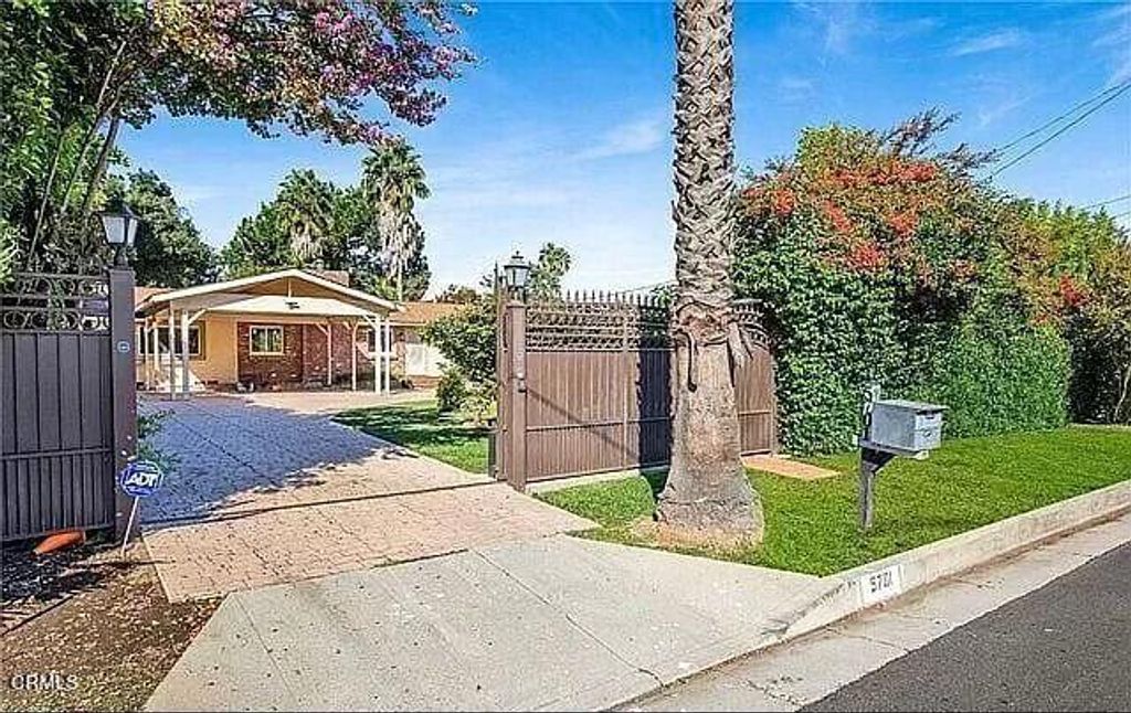 Photo of 5701 Corbin Avenue, Tarzana, CA 91356 (MLS # P1-25076)