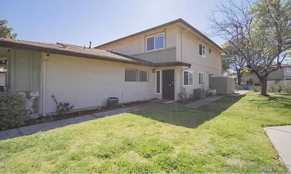 Discover comfort, convenience, and privacy in this beautifully updated 2 bedroom, 1 bath gem, in the vibrant heart of Santee. Located in a quiet community, this townhome style unit has no neighbors above or below. The spacious primary bedroom offers a walk-in closet, providing ample storage. Step into the modernized kitchen with granite countertops, and lighting. The home boasts Luxury Vinyl Plank flooring throughout, an updated bathroom, and double pane windows for energy efficiency. Stay comfortable year-round with a newer HVAC system. Additional conveniences include Two parking spaces, one space in an enclosed shared carport with automatic door and extra storage. The other parking space is outside the enclosed carport. A shared laundry room just steps away from the carport. Walk to nearby shopping centers, fitness facilities, parks, and the trolley station, with easy access to the 52 and 67 freeways—perfect for commuters and lifestyle seekers alike. This home offers the ideal blend of modern upgrades and unbeatable location. Don’t miss this opportunity!
