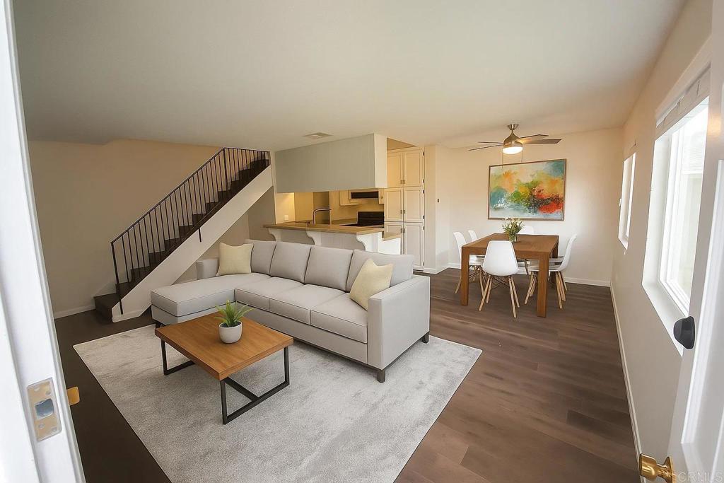 First-time home buyer? Looking for an investment property? Check out this move-in ready 2 bedroom, 1 bath gem, in the vibrant heart of Santee. Located in a quiet community, this VA approved townhome style unit has no neighbors above or below. The spacious primary bedroom offers a walk-in closet, providing ample storage. Step into the modernized kitchen with granite countertops, and lighting. The home boasts Luxury Vinyl Plank flooring throughout, an updated bathroom, and double pane windows for energy efficiency. Stay comfortable year-round with a newer HVAC system. Additional conveniences include Two parking spaces, one space in an enclosed shared carport with automatic door and extra storage. The other parking space is outside the enclosed carport. A shared laundry room just steps away from the carport. Walk to nearby shopping centers, fitness facilities, parks, and the trolley station, with easy access to the 52 and 67 freeways—perfect for commuters and lifestyle seekers alike. This home offers the ideal blend of modern upgrades and unbeatable location. Don’t miss this opportunity!