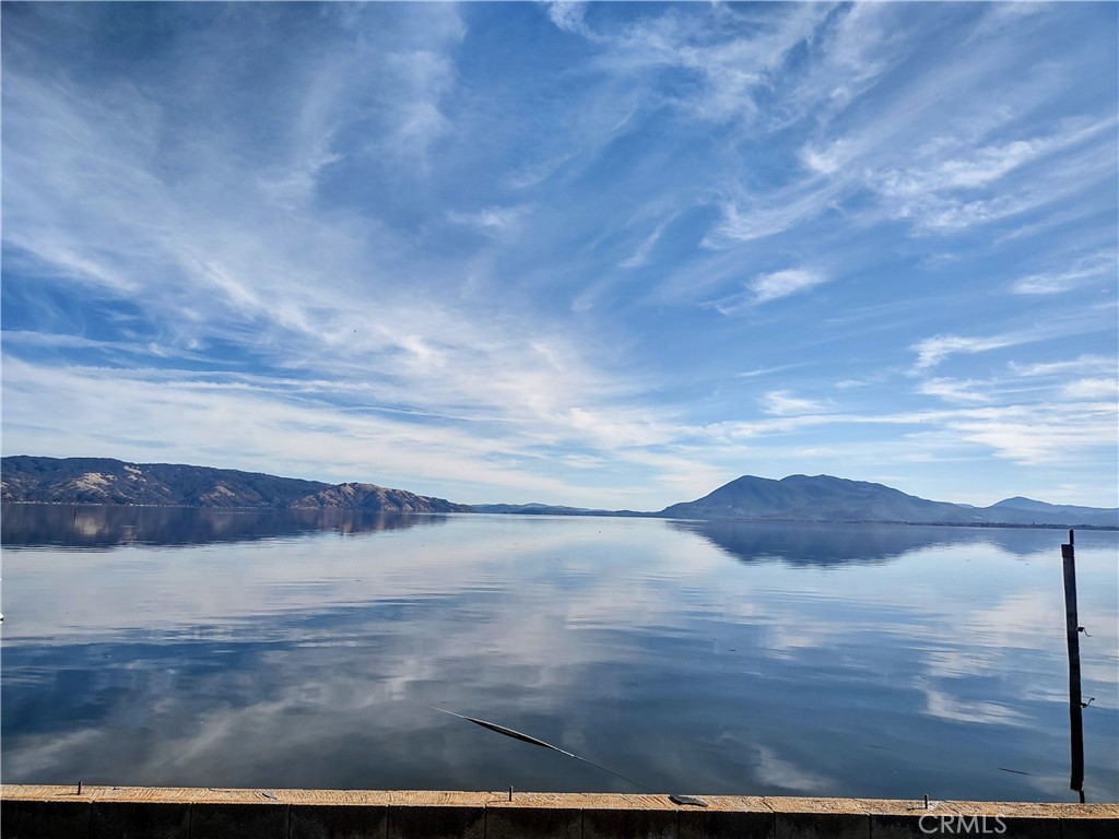 BEAUTIFUL LAKEFRONT LOT IN NORTH LAKEPORT! Over half of an acre! This one of a kind lakefront lot is lovely, level and has unobstructed views of the lake and Mount Konocti. Seller has put $75,000 into seawall improvements so it's ready for you to build your dream home on. Lot is approximately 160ft from street to seawall. Two miles north of Lakeport City Limits and two miles south of the hospital. Public sewer and water hook ups available at the street. Come and see for yourself what a great property this is!