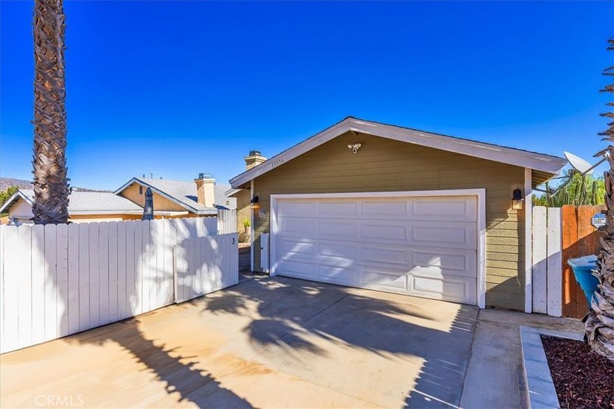 Welcome to this light and bright, single-level home in Lake Elsinore featuring 3 bedrooms and 2 full baths. The inviting open floorplan creates a seamless flow between the living room, dining area, and kitchen, showcasing granite countertops and custom-painted cabinets, in an efficiently designed space — perfect for both everyday living and entertaining.



Step outside to a huge covered deck where you can relax or host gatherings while enjoying peekaboo views of the lake. The property backs to Cleveland National Forest land, offering peace, privacy, and no rear neighbors.



Additional highlights include a 2-car garage, low-maintenance landscaping, with a spacious front courtyard, with privacy fencing. This is a prime location with easy access to Ortega Highway and Interstate 15. You’ll be close to restaurants, shopping, recreation, and more — everything you need for convenient and comfortable living. Low property tax and no HOA.



Come see why this home is the perfect blend of charm, comfort, and location!