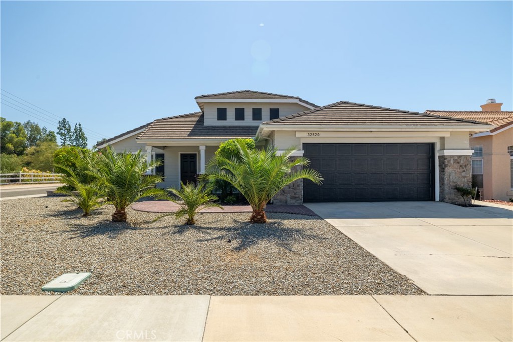 ***LOW TAXES, NO HOA***Nestled on a flat corner lot, this beautiful single-story 3-bed, 2-bath home offers comfortable California living. Inside, enjoy a bright dining room and living room with plantation shutters and a welcoming fireplace. Designer flooring throughout the whole house. The kitchen features a beautiful custom floor to ceiling cabinet perfect for your coffee bar and storage. Kitchen also offers updated appliances, stove, dishwasher, and microwave. Updated vanities and custom mirrors in both bathrooms as well newer toilets and light fixtures. While the garage includes built-in shelving and attic access for extra storage. Step outside to a generous backyard with a slate-tiled patio and built-in BBQ—perfect for summer gatherings. With low property taxes, no HOA, and close proximity to parks, schools, and shopping, this home blends affordability, convenience, and character seamlessly.