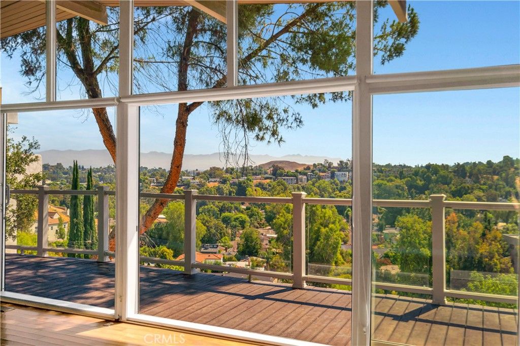 Photo of 5102 Medina Road, Woodland Hills, CA 91364 (MLS # SR25185231)