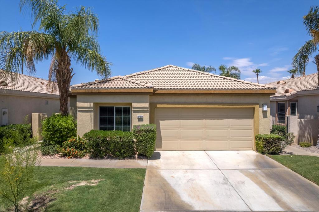 Welcome to this beautifully maintained 1,800+ sq ft villa on a quiet interior street at Desert Princess Country Club. Indulge in luxury and practicality with a flexible, popular floorplan featuring two ensuite bedrooms, plus a dedicated office and a sitting room that easily converts to a third bedroom.Step into the expansive family room, anchored by a cozy fireplace and framed by sliding glass doors with sweeping golf course vistas. The gourmet kitchen is a chef's dream--complete with island, breakfast bar, ample cabinetry, and casual dining space. A convenient laundry room, generous closets, and a powder bath add daily living ease.Outside, discover a private saltwater pool and spa nestled amidst lush palms and flowering shrubs, offering the ultimate indoor-outdoor lifestyle. A covered patio and side garden provide serene spots for relaxation or entertaining. The entry courtyard offers extra privacy and curb appeal.Desert Princess Country Club is a premier, guard-gated resort community featuring a 27-hole championship golf course, 28 pools, 27 spas, tennis and racquetball courts, fitness center, clubhouse dining, and scenic walking trails. Nestled in the San Jacinto foothills, it's just minutes from Palm Springs restaurants, shopping, cultural attractions, and the airport. Ideal for owners or investors, this home stands out in Desert Princess at a compelling price in today's lively vacation‑rental market. Your private desert oasis awaits.