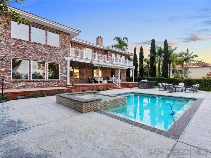 Experience breathtaking ocean and lagoon views from this gated, custom-built estate located at the end of a quiet cul-de-sac in the prestigious La Costa Estates. Situated on an expansive 27,000 sq. ft. lot with NO HOA or Mello-Roos, this 5bd/4ba, 5,046 sf. home is an entertainer’s dream, offering luxury, privacy, and modern upgrades. Step inside to soaring ceilings, a grand staircase, and giant picture windows that flood the home with natural light. The chef’s kitchen utilizes an open-layout and features Viking appliances, exquisite granite countertops, a full backsplash, and premium cabinetry. A dual staircase enhances the home’s open flow, while three cozy fireplaces warm the living room, family room, and master suite. The ocean-facing primary suite boasts a balcony overlooking the sparkling pool, hot tub, and putting green. The outside also includes a gas-fed firepit and BBQ area, all designed for seamless indoor-outdoor entertaining. A long gated driveway, oversized three-car garage, and RV/boat parking provide ample space for vehicles and storage. Located near a protected nature preserve ensuring unobstructed views, this quiet retreat offers easy access to top-rated schools, the Omni La Costa Resort & Golf Club. Don’t miss this rare opportunity to own one of the best ocean-view homes available in the area!!