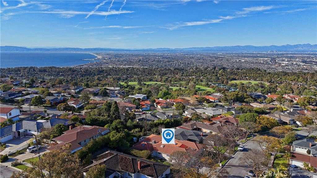 Welcome to 26235 Birchfield Drive - where panoramic coastal views meet true single-level ease. Perched in one of the South Bay’s most coveted hillside neighborhoods, this 3,068 sq ft home offers sweeping city-to-ocean vistas from the Queen’s Necklace to downtown LA - and it's priced below all other single level view homes per square foot. Freshly painted inside and out, the home features wide hallways, generous doorways, and level transitions for seamless movement. The layout includes a potential ADU, guest quarters, office or bonus room - ideal for multi-gen living, creative use, or added income. Gated RV parking adds even more flexibility, while direct access from the garage to the kitchen makes everyday living practical and easy.
The kitchen connects to both casual and formal living areas, and the primary suite includes a walk-in closet, steam shower, and commanding ocean views. Maple floors, abundant natural light, and oversized rooms complete the package. The elevated back deck is a sunset showstopper - with low-maintenance grounds perfect for a lock-and-leave lifestyle. No HOA. No stairs. No compromise. Just value, views, and versatility - all in one of Palos Verdes’ most desirable zip codes.