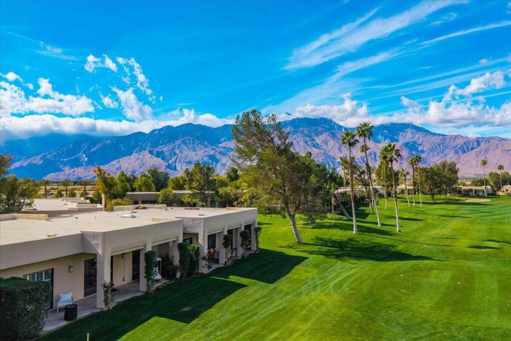 Welcome to your desert escape--an updated 2-bedroom, 2-bath condo nestled in the vibrant resort community of Desert Princess Country Club. Perfect for full-time living, a relaxing getaway, or a smart investment, this home offers the ideal blend of comfort, style, and flexibility.Enjoy sweeping views of lush putting greens and panoramic mountains from this beautifully maintained unit. The spacious open layout features two private primary suites, each with its own en suite bath--ideal for hosting guests or short-term tenants. The living and dining areas extend seamlessly to a private patio, creating the perfect space to unwind or entertain.Residents and guests are drawn to the resort-style amenities, including a newly renovated gym and spa, multiple pools, tennis and pickleball courts, and an on-site restaurant. Golf lovers enjoy discounted access to the 27-hole championship course.With HOA-approved short-term rentals, this updated unit is more than just a vacation spot--it's a smart investment in one of the desert's most sought-after communities.