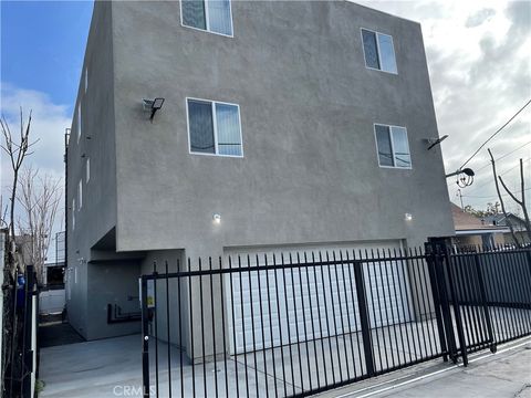 Photo of 1432 E 20th Street, Los Angeles, CA 90011 (MLS # SB25157354)