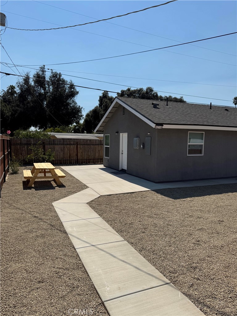 Don't miss this brand new 2025 built single family residence in the 92504 zip code of Riverside. Located on a tree lined street close to schools, shopping and the 91 freeway. The home is an ADU (Accessory Dwelling Unit) with it's own separate address and it is completely detached from the home in the front. The home has it's own yard, separate entrance and designated parking in the driveway. There is also a large private storage shed. No garage. This home has 2 bedrooms and a large bathroom with shower and bathtub combo. The home has an open concept floor plan with a large living room, kitchen with pantry and lots of cabinet storage space. There is also a separate inside laundry room. The bedroom closets have double shelf and pole for increased storage. Windows are double pane with blinds and the walls were built with 2x6's so there is heavy insulation allowing the home to stay cool in the summer and warm in the winter. Each room has it's own individually controlled A/C and Heating unit.