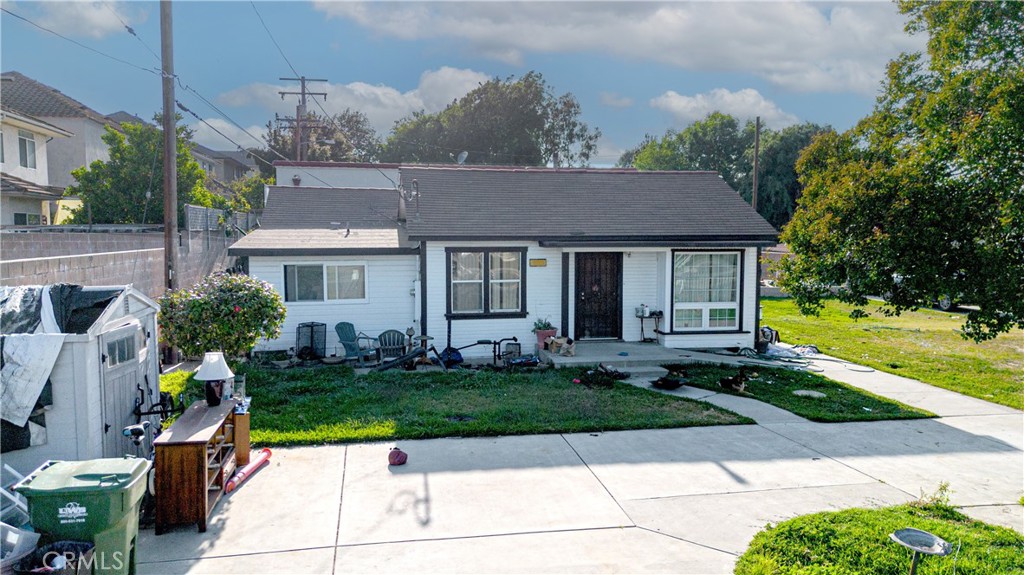 **Charming Property with Versatile Buildings
Discover this unique opportunity on a sprawling 12,000 square-foot lot, featuring a cozy 1,190 square-foot home and an impressive 2,000 square-foot versatile building.
The main residence boasts two inviting bedrooms and a well-appointed bathroom, providing the ideal layout for comfortable living. The open-concept living area is filled with natural light.
Adjacent to the home is a remarkable multi-functional building that opens up endless possibilities. This spacious structure includes a loft with two additional bedrooms and two bathrooms.The large garage area can accommodate approximately six cars, making it an ideal space for car enthusiasts or as extra storage.
Located in a desirable neighborhood, this property offers ample outdoor space for gardening, recreation, or future expansion opportunities.
Schedule your showing today and envision all the possibilities this exceptional property has to offer!