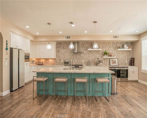 Photo of 7309 Arcadia DR, Huntington Beach, CA 92648 (MLS # DW26114957)