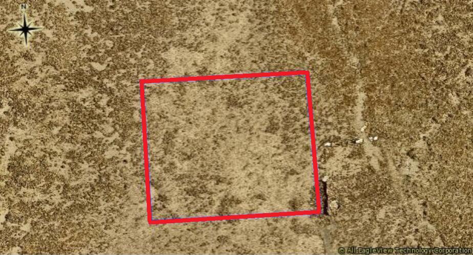 Flat 2.56 acre investment property with Light Industrial zoning. Only a couple miles from Sun Village. Seller is motivated, make an offer!