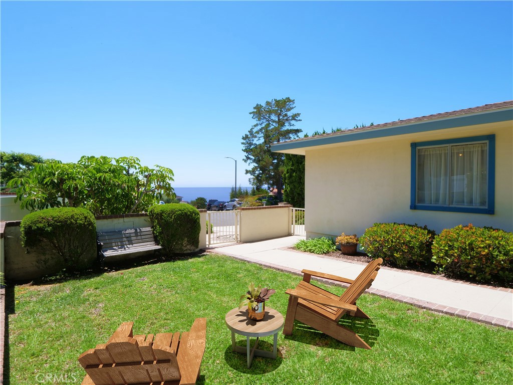 Welcome to your dream home nestled in the picturesque community of Rancho Palos Verdes. This charming single-family residence offers expansive living spaces with a floor plan designed for comfort, flexibility and style. With five spacious bedrooms and 2.5 bathrooms, including a primary ensuite, this home is ideal for those seeking a classic home with a light, airy and functional floor plan!
Step inside to discover a welcoming atmosphere, highlighted by a cozy fireplace that promises warmth and relaxation. The living area seamlessly transitions into the dining space, perfect for entertaining family and friends. The kitchen has ample cabinet space, large counters and overlooks the lushly landscaped and very private backyard and it opens to the great room with informal dining area. Upstairs, all five generously proportioned bedrooms provide a peaceful retreat bathed in natural light. In addition to plenty of closet space in each bedroom, the large upstairs hallway features storage cabinets galore. The primary bedroom is a true sanctuary, complete with vaulted ceilings, walk in closet and an ensuite bathroom.
Outside, the property boasts a beautifully landscaped yard, offering a a delightful blend of tranquility and outdoor enjoyment. The large patio and conversation area with firepit are perfect for al fresco dining or simply unwinding after a long day. The side yard has plenty of room to grow your own vegetables too!
This turnkey home with ocean views situated at the top of a quiet cul-de-sac and conveniently located close to award winning Palos Verdes Peninsula Schools, plus parks, shopping, dining and entertainment is an exceptional find for the discerning buyer!