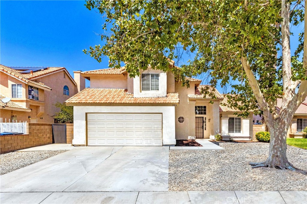 Welcome to 771 E Avenue K-7, Lancaster, CA — a well-maintained two-story home offering 4 bedrooms, 3 bathrooms, and nearly 2,000 sq. ft. of functional living space. Located on a quiet residential street, this property is designed for everyday comfort and versatility.
Inside, you'll find a bright and open layout featuring vaulted ceilings in the living room, a formal dining area, and a cozy family room with fireplace. The updated kitchen includes quartz countertops, ample cabinetry, and a breakfast nook—ideal for casual meals or morning routines.
A standout feature is the enclosed sunroom, offering flexible space for entertaining, hobbies, or simply enjoying natural light throughout the year.
Upstairs, the spacious primary suite includes an en-suite bath and generous closet space. Three additional bedrooms and a full bathroom provide room for family, guests, or remote work setups. A half bath is conveniently located on the main floor. The fenced backyard is ready for outdoor activities, while the attached 2-car garage, dedicated laundry room, and central heating & A/C add everyday convenience. With close proximity to schools, shopping, dining, and freeway access, this home delivers space, comfort, and accessibility in one complete package. SECTION 8/HOUSING VOUCHER APPLICANTS WELCOME TO APPLY.