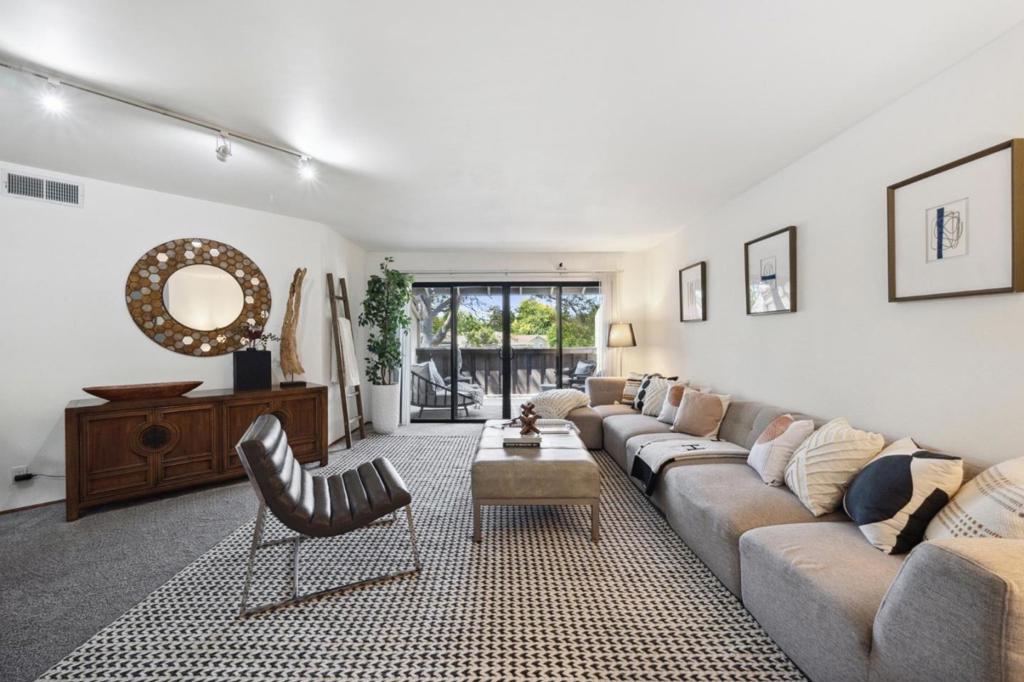 Discover the perfect mix of style and convenience in this spacious top floor 2-bedroom, 2-bathroom condo with an extra den/office space. It's more than just a homeit's a special place designed to make you happy. You'll love having an in-unit washer/dryer, central AC, and a walk-in closet in the main bedroom, plus two extra storage closets. The living room has double sliding glass doors that open to the balcony, making it feel open and airy. There are also two more balconies, great for morning coffee or relaxing after a long day. The community grounds are green and pretty, with a swimming pool, tennis courts, and a clubhouse. This condo is just minutes away from major tech offices like Apple, Google, LinkedIn, Amazon, and Facebook. You can walk to local farmers' markets, unique shops, and a variety of restaurants. Enjoy Sunnyvales exciting food scene, knowing home is close by. This property offers a perfect mix of style, functionality, and location, all within a spacious floor plan. Opportunities like this don't come often.