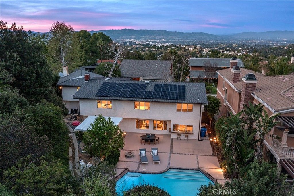 Photo of 3831 Saint Johnswood Drive, Woodland Hills, CA 91364 (MLS # SR26045080)